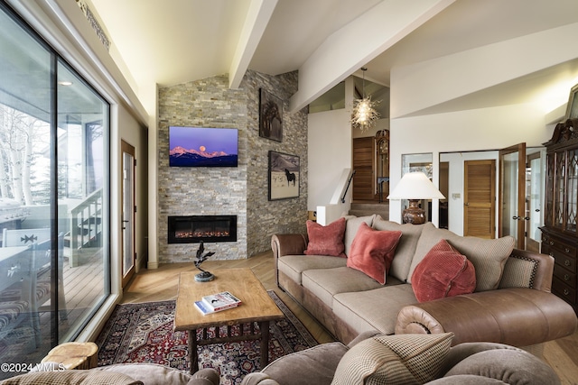 living room with a fireplace, lofted ceiling with beams, and wood finished floors