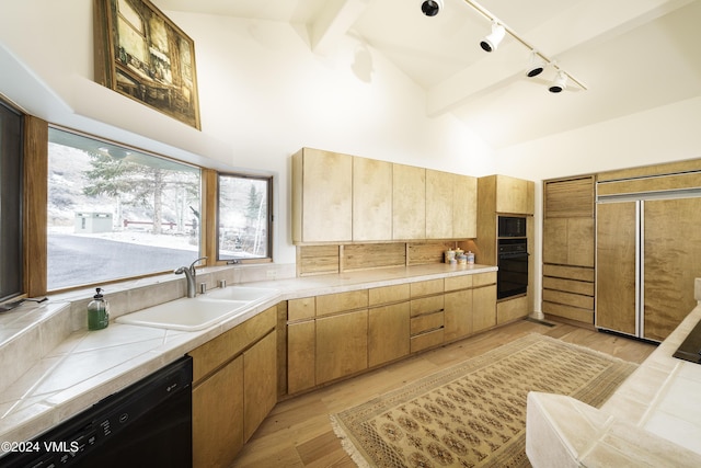 kitchen with tile countertops, a sink, high vaulted ceiling, beamed ceiling, and black appliances