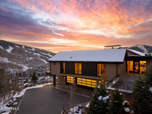 view of front of property with a mountain view