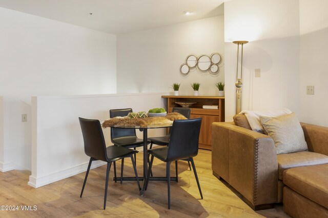 dining room with light hardwood / wood-style flooring