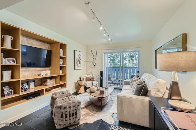 9 Vail Rd Unit 16, Vail, CO 81657 - tiled living area featuring track lighting and baseboards