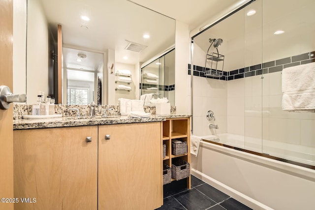 full bathroom featuring visible vents, enclosed tub / shower combo, tile patterned flooring, vanity, and recessed lighting