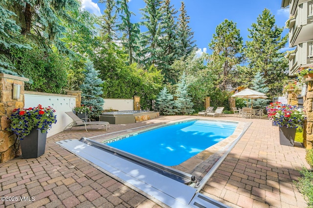 9 Vail Rd Unit 16, Vail, CO 81657 - swimming pool with a patio area
