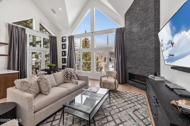 dining area with stairway, wine cooler, a dry bar, and light wood finished floors