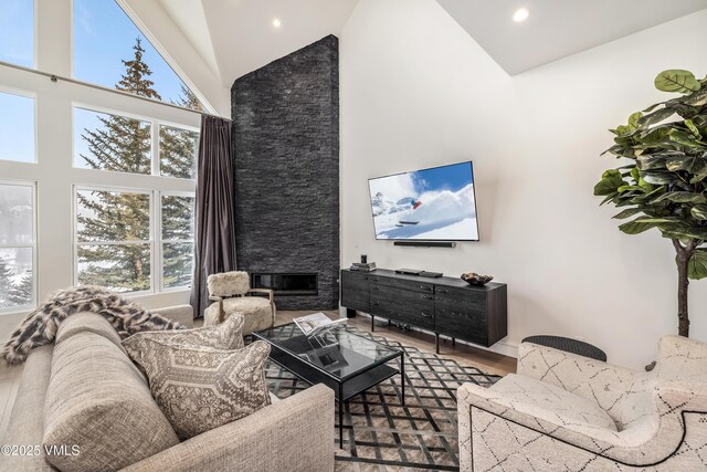 dining space with recessed lighting, light wood-style floors, and vaulted ceiling