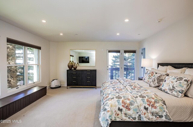 living area with a wall mounted air conditioner, beamed ceiling, light carpet, high vaulted ceiling, and baseboards