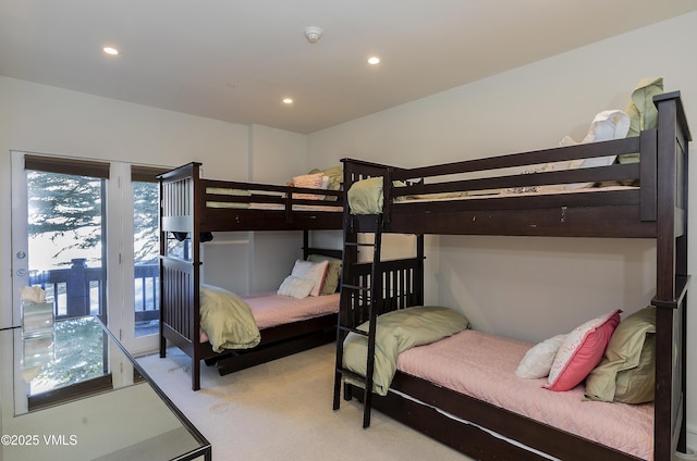 carpeted bedroom featuring recessed lighting and access to outside