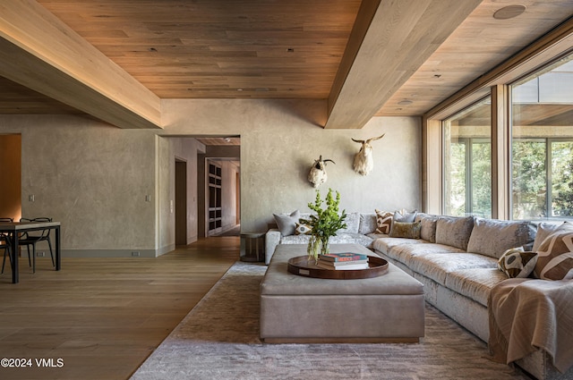 100 Vail Rd, Vail, CO 81657 - living area with a wooden ceiling with exposed beams and wood finished floors