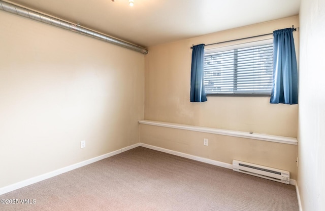 empty room with baseboards, baseboard heating, and carpet flooring