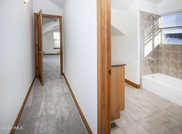 49 Bluffs Dr, Eagle, CO 81631 - corridor featuring light tile patterned floors