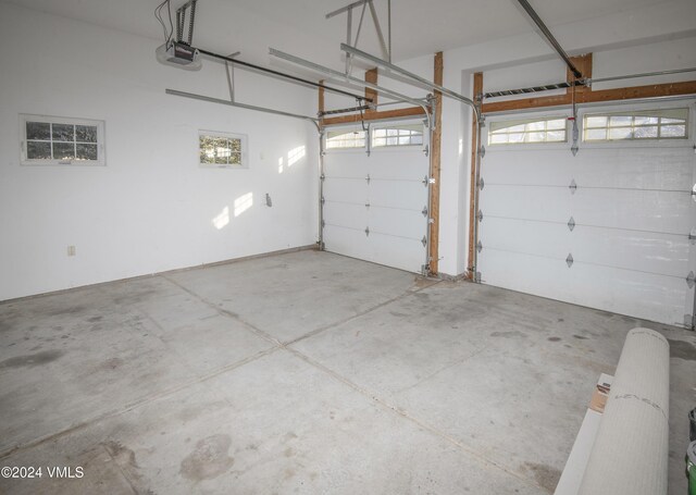 49 Bluffs Dr, Eagle, CO 81631 - garage featuring a garage door opener