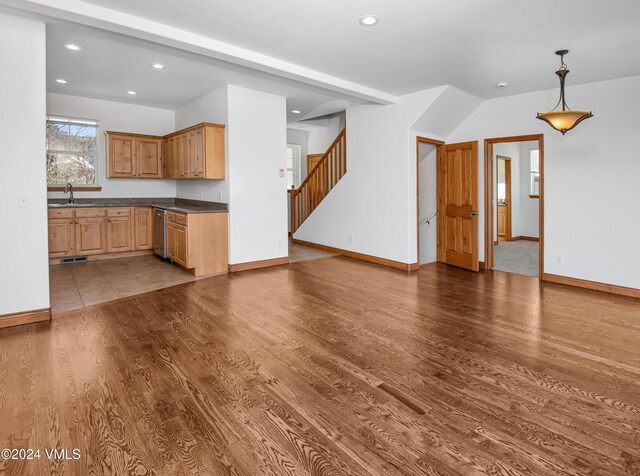 49 Bluffs Dr, Eagle, CO 81631 - kitchen featuring pendant lighting, sink, hardwood / wood-style flooring, and dishwasher