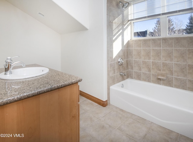 49 Bluffs Dr, Eagle, CO 81631 - bathroom featuring tiled shower / bath, tile patterned floors, and vanity