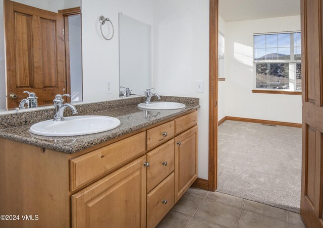 49 Bluffs Dr, Eagle, CO 81631 - bathroom featuring vanity and tile patterned floors