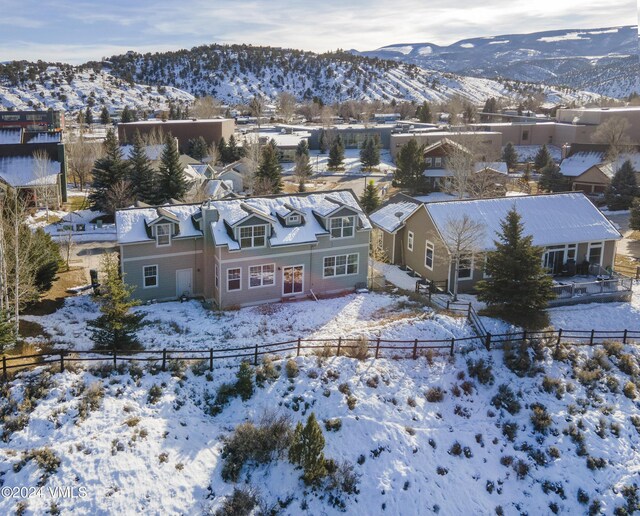 49 Bluffs Dr, Eagle, CO 81631 - snowy aerial view featuring a mountain view