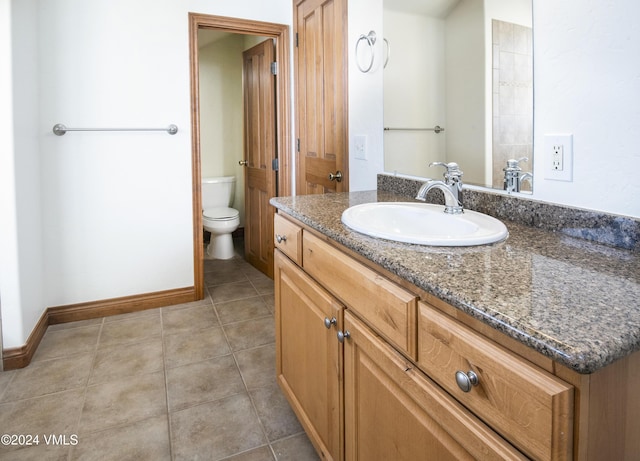 49 Bluffs Dr, Eagle, CO 81631 - bathroom with vanity, tile patterned floors, and toilet