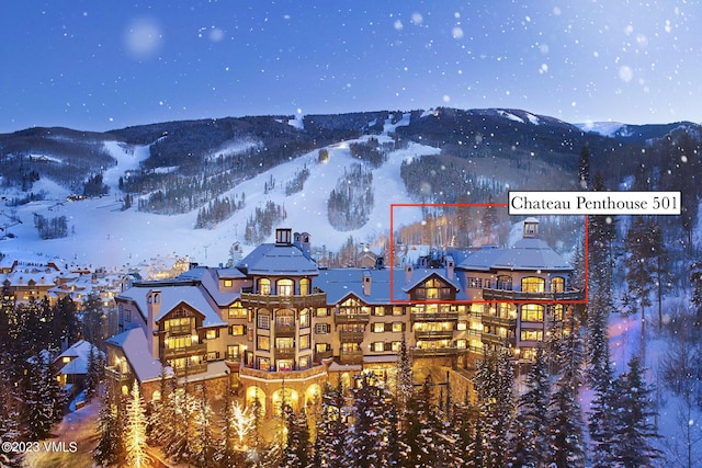 17 Chateau Ln Unit 501, Beaver Creek, CO 81620 - snowy aerial view featuring a mountain view