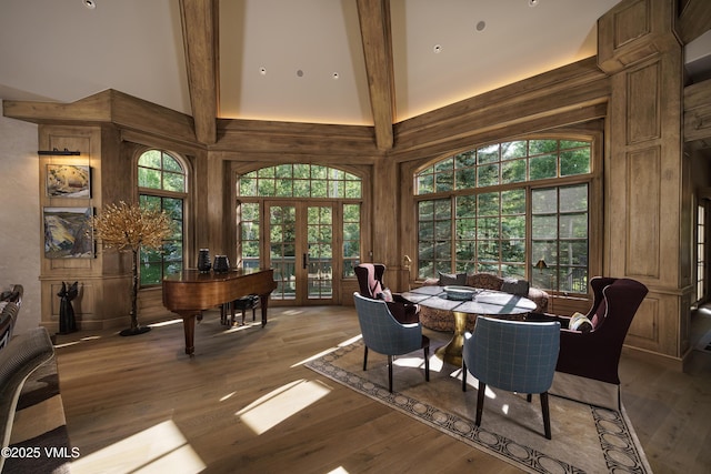 17 Chateau Ln Unit 501, Beaver Creek, CO 81620 - dining area with french doors, high vaulted ceiling, wood finished floors, beamed ceiling, and healthy amount of natural light