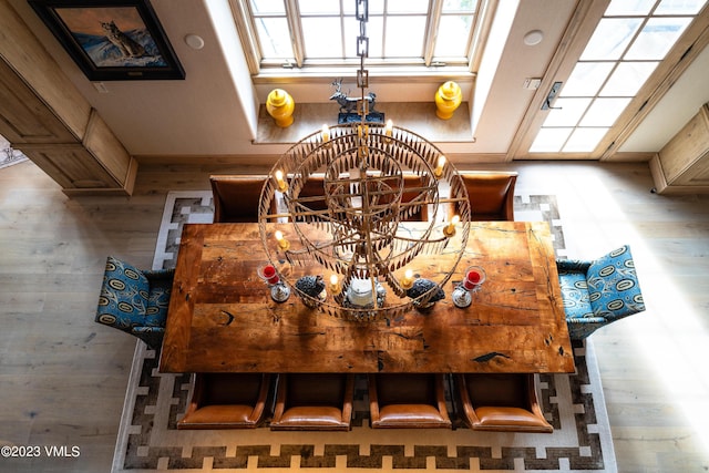 17 Chateau Ln Unit 501, Beaver Creek, CO 81620 - dining area featuring a chandelier and wood finished floors
