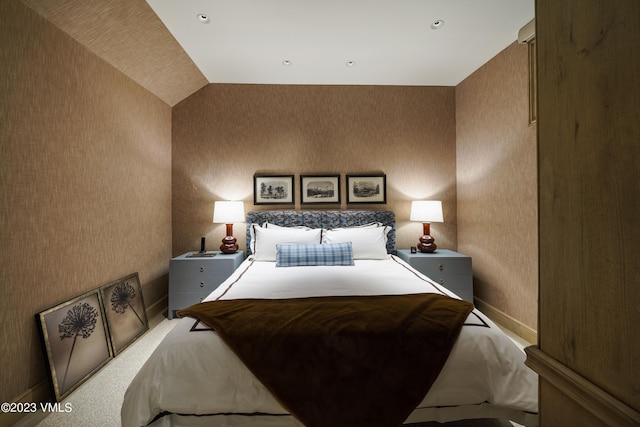 17 Chateau Ln Unit 501, Beaver Creek, CO 81620 - carpeted bedroom featuring wallpapered walls and vaulted ceiling