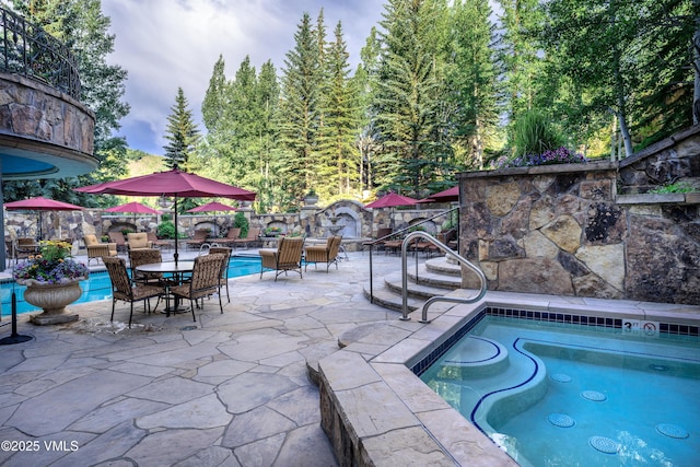 17 Chateau Ln Unit 501, Beaver Creek, CO 81620 - view of pool with a patio area, a fenced backyard, and outdoor dining space