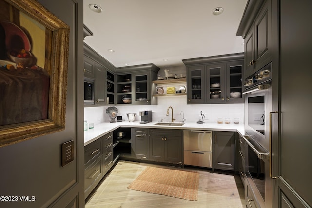 17 Chateau Ln Unit 501, Beaver Creek, CO 81620 - kitchen featuring open shelves, appliances with stainless steel finishes, backsplash, light wood finished floors, and recessed lighting