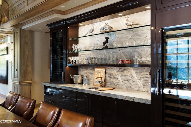 17 Chateau Ln Unit 501, Beaver Creek, CO 81620 - indoor wet bar featuring decorative backsplash