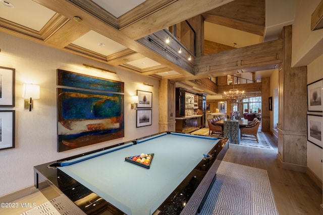 17 Chateau Ln Unit 501, Beaver Creek, CO 81620 - rec room featuring wood finished floors, a chandelier, billiards table, beamed ceiling, and coffered ceiling