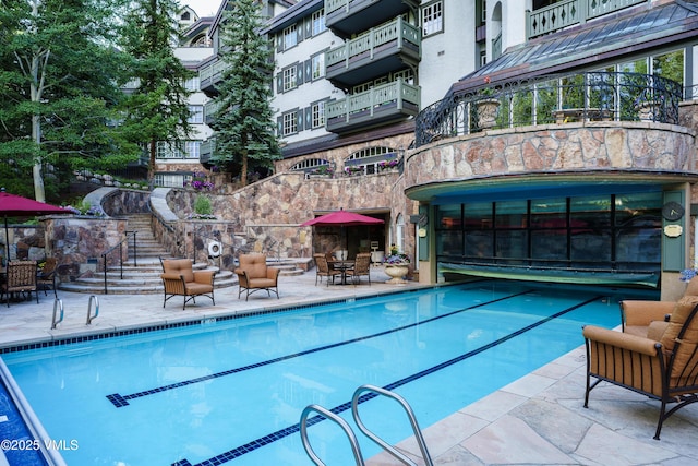 17 Chateau Ln Unit 501, Beaver Creek, CO 81620 - community pool with stairway and a patio