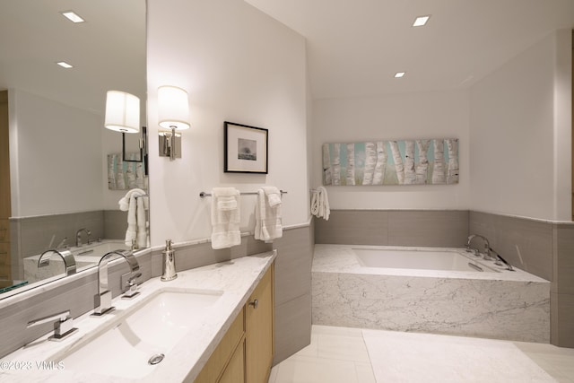 17 Chateau Ln Unit 501, Beaver Creek, CO 81620 - full bathroom featuring vanity, a garden tub, and tile patterned floors