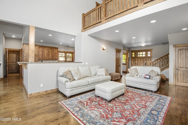 0017 Harvester Ct, Eagle, CO 81631 - living area featuring healthy amount of natural light, stairs, wood finished floors, and recessed lighting
