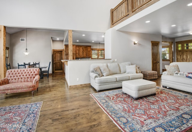 0017 Harvester Ct, Eagle, CO 81631 - living room with dark wood-type flooring, plenty of natural light, a towering ceiling, and recessed lighting