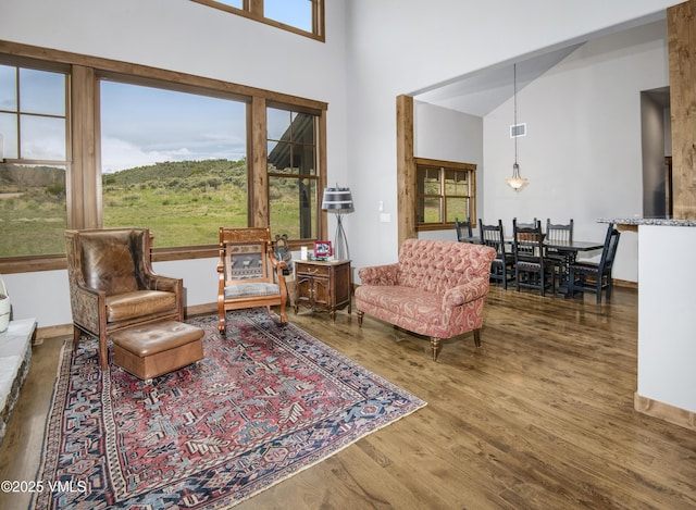 0017 Harvester Ct, Eagle, CO 81631 - living area with a high ceiling and wood finished floors