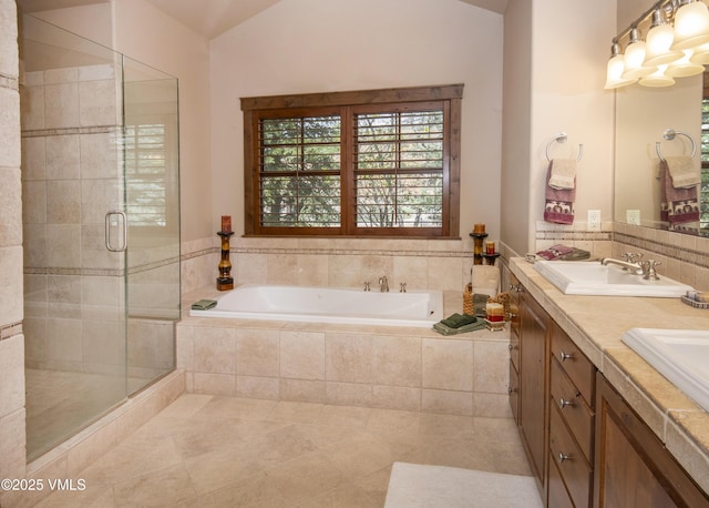 0017 Harvester Ct, Eagle, CO 81631 - full bath featuring a bath, a stall shower, tile patterned floors, and double vanity