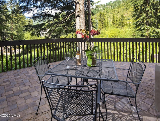 view of patio featuring outdoor dining area