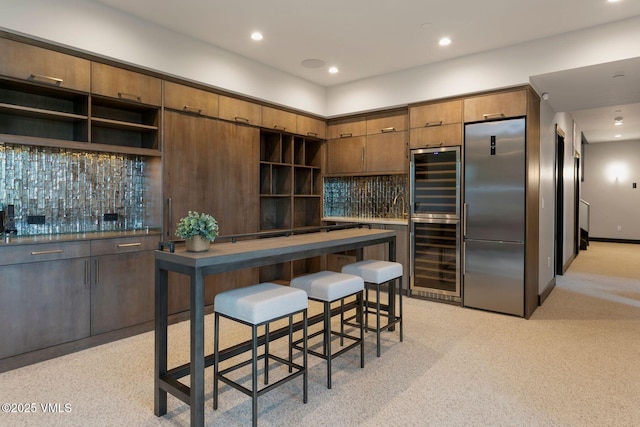420 Little Andorra Rd, Edwards, CO 81632 - kitchen featuring stainless steel refrigerator, wine cooler, open shelves, and recessed lighting