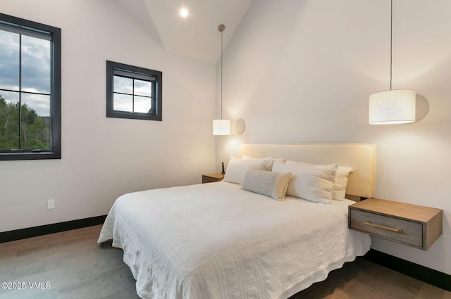 420 Little Andorra Rd, Edwards, CO 81632 - bedroom featuring lofted ceiling and wood finished floors