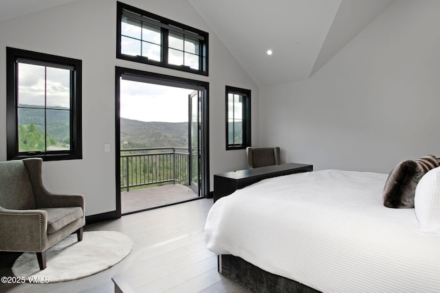 420 Little Andorra Rd, Edwards, CO 81632 - bedroom with vaulted ceiling, access to exterior, recessed lighting, and a mountain view