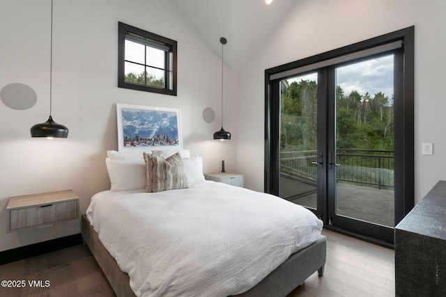 420 Little Andorra Rd, Edwards, CO 81632 - bedroom with multiple windows, vaulted ceiling, access to exterior, and french doors