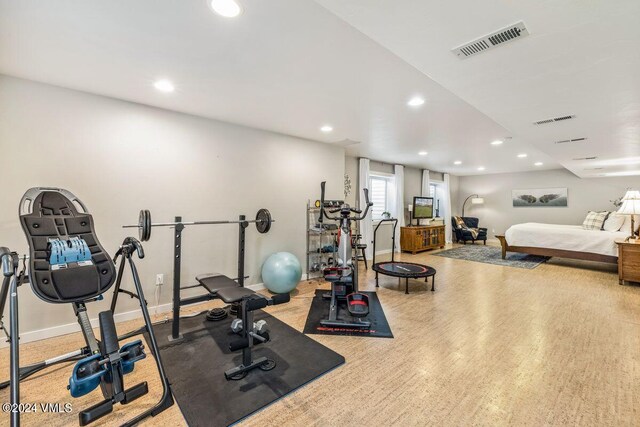 exercise area featuring light wood-type flooring