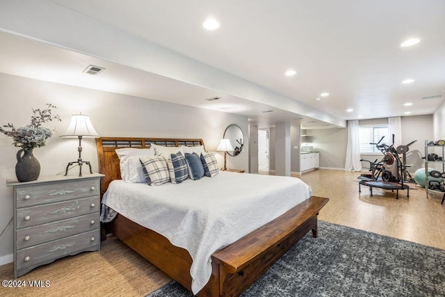 bedroom featuring hardwood / wood-style floors