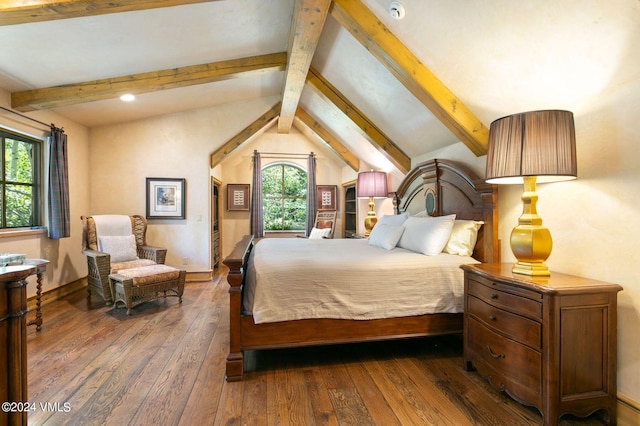 bedroom featuring dark wood-type flooring and vaulted ceiling with beams