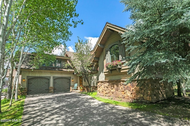 view of front of property with a garage