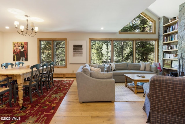 2111 Vermont Rd Unit A, Vail, CO 81657 - living area featuring a chandelier, light wood-type flooring, and recessed lighting