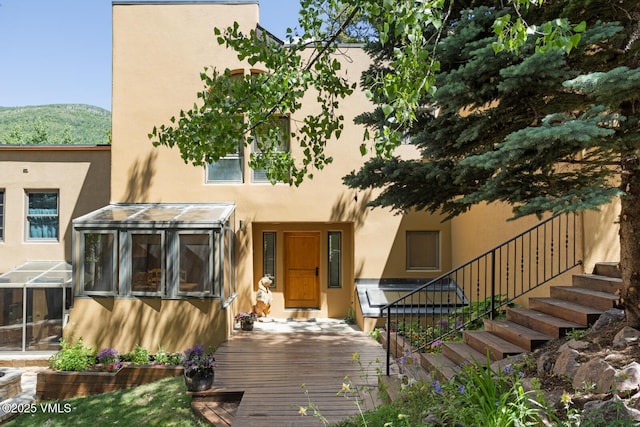 2111 Vermont Rd Unit A, Vail, CO 81657 - view of front of home featuring stucco siding and stairway
