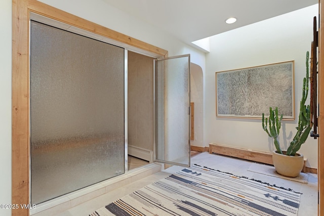 2111 Vermont Rd Unit A, Vail, CO 81657 - bathroom with a baseboard heating unit, a shower stall, and recessed lighting