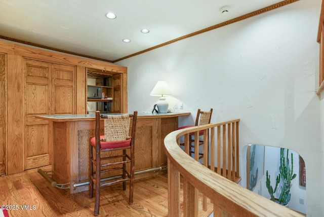 2111 Vermont Rd Unit A, Vail, CO 81657 - indoor dry bar featuring crown molding, light wood-style flooring, and recessed lighting