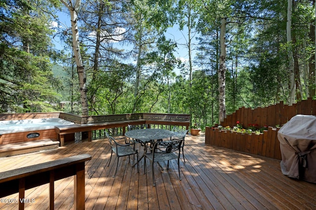 2111 Vermont Rd Unit A, Vail, CO 81657 - deck with a hot tub, outdoor dining area, and grilling area