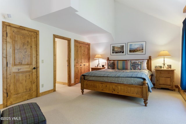 2111 Vermont Rd Unit A, Vail, CO 81657 - bedroom with light colored carpet and high vaulted ceiling