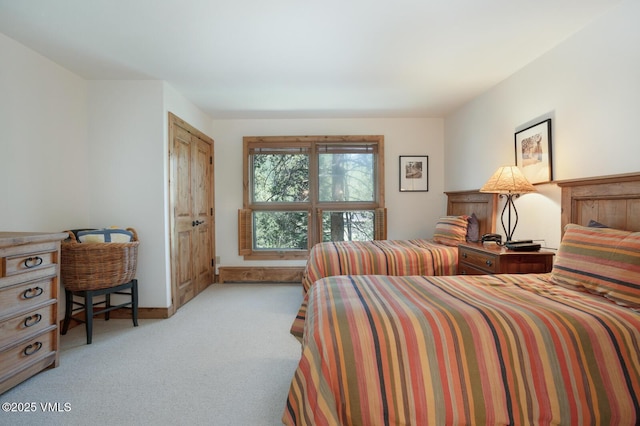 2111 Vermont Rd Unit A, Vail, CO 81657 - bedroom featuring light carpet and baseboards